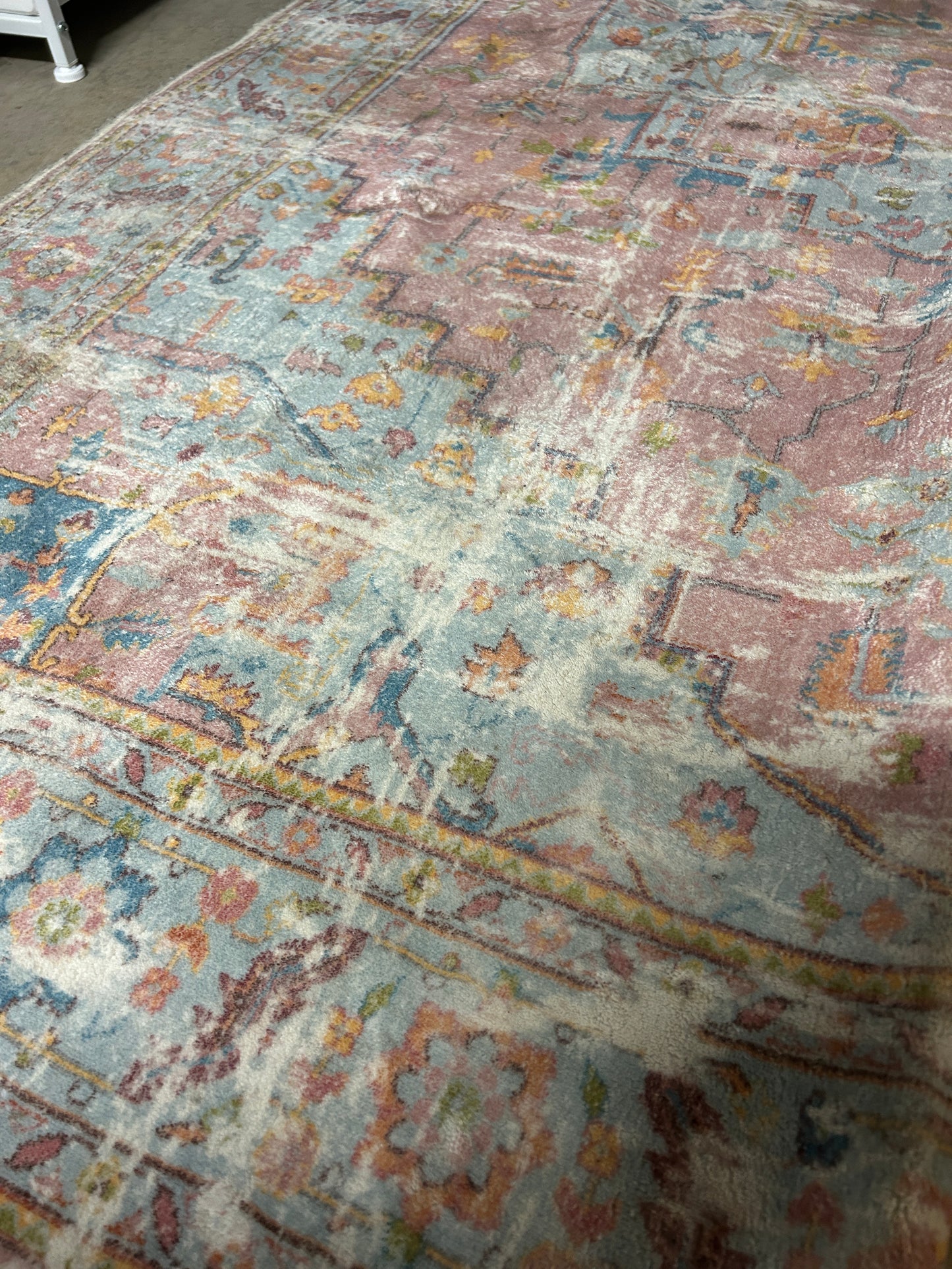 Washable 5x7 dusty pink blue rug.