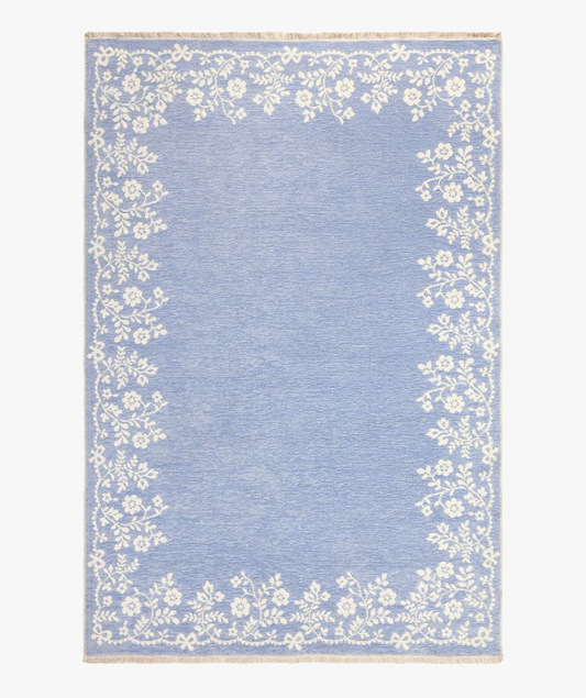 Pottery Barn Teen x LoveShackFancy blue and white reversible washable rug.