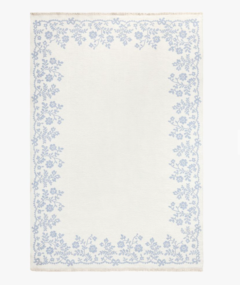 Pottery Barn Teen x LoveShackFancy blue and white reversible washable rug.