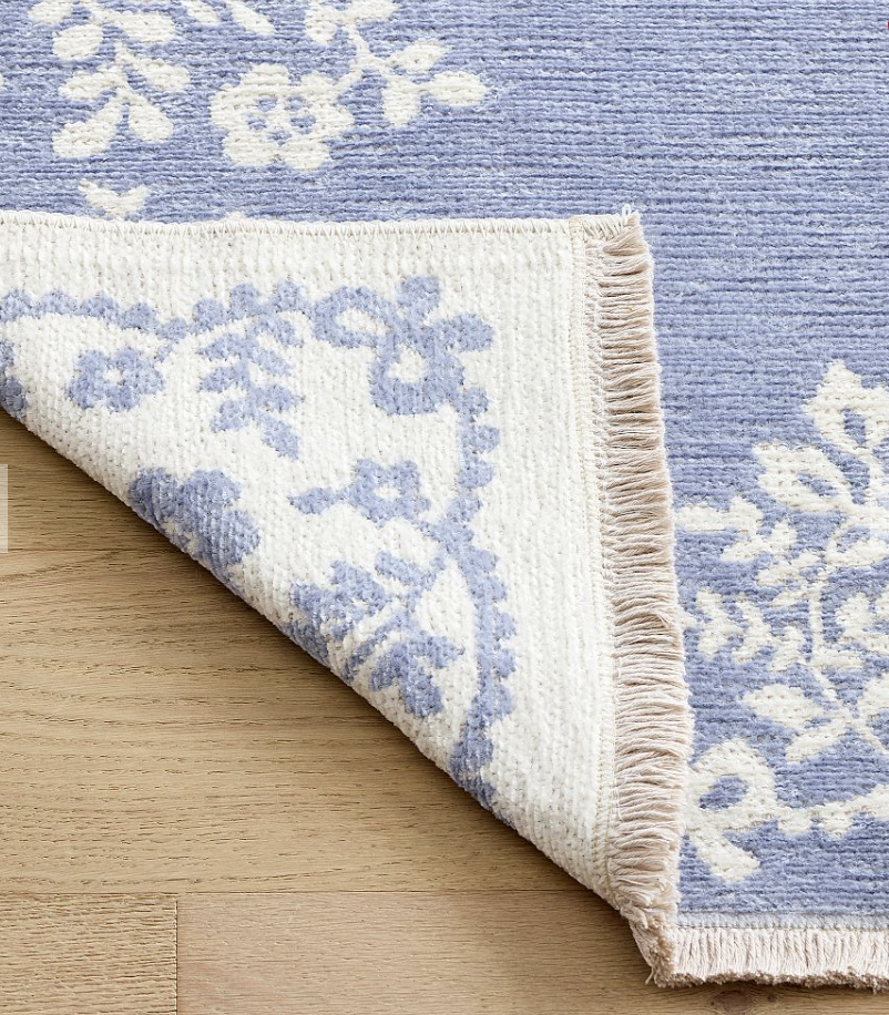 Pottery Barn Teen x LoveShackFancy blue and white reversible washable rug.