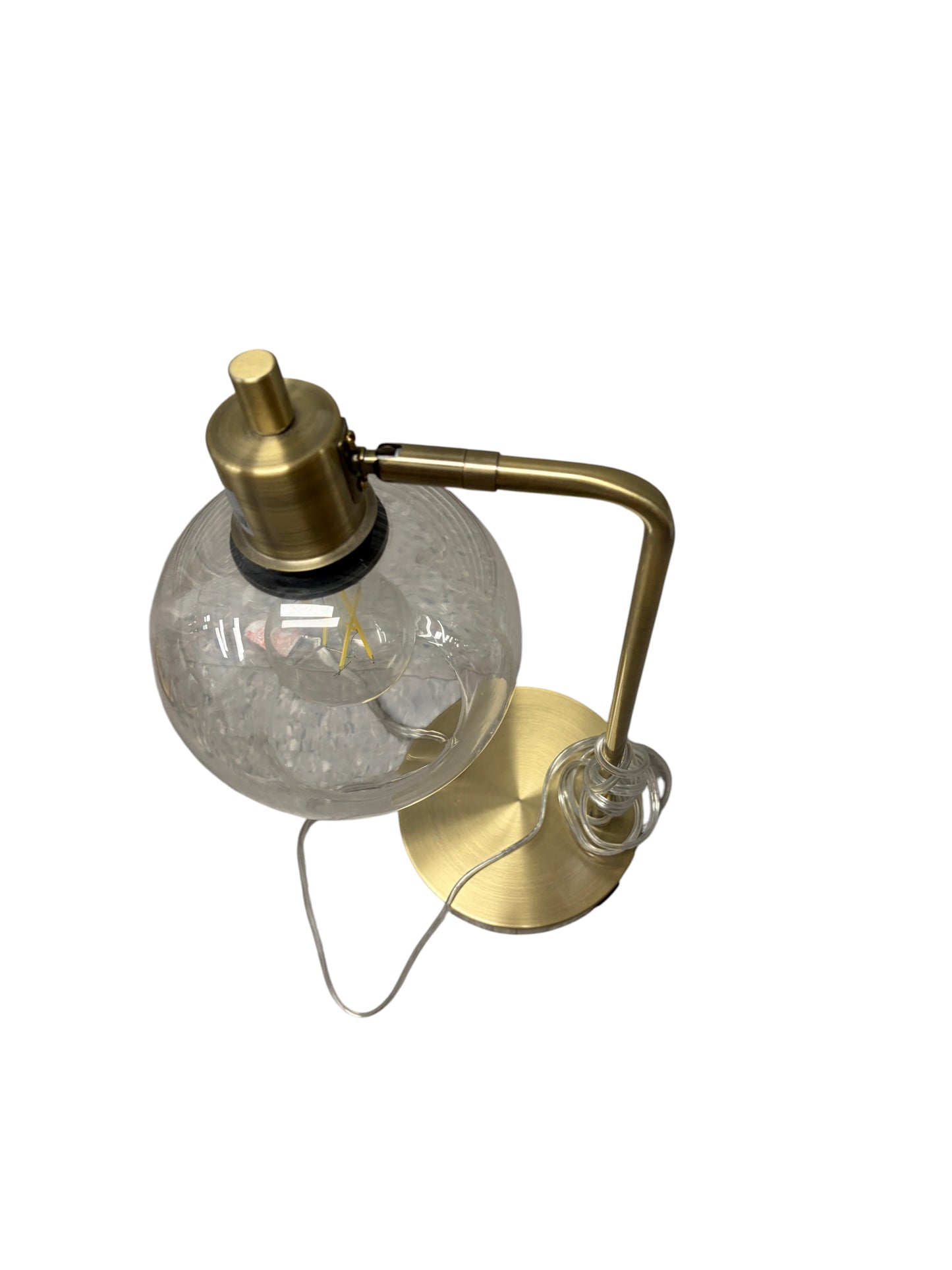Gold desk lamp with clear glass shade and USB charging port.