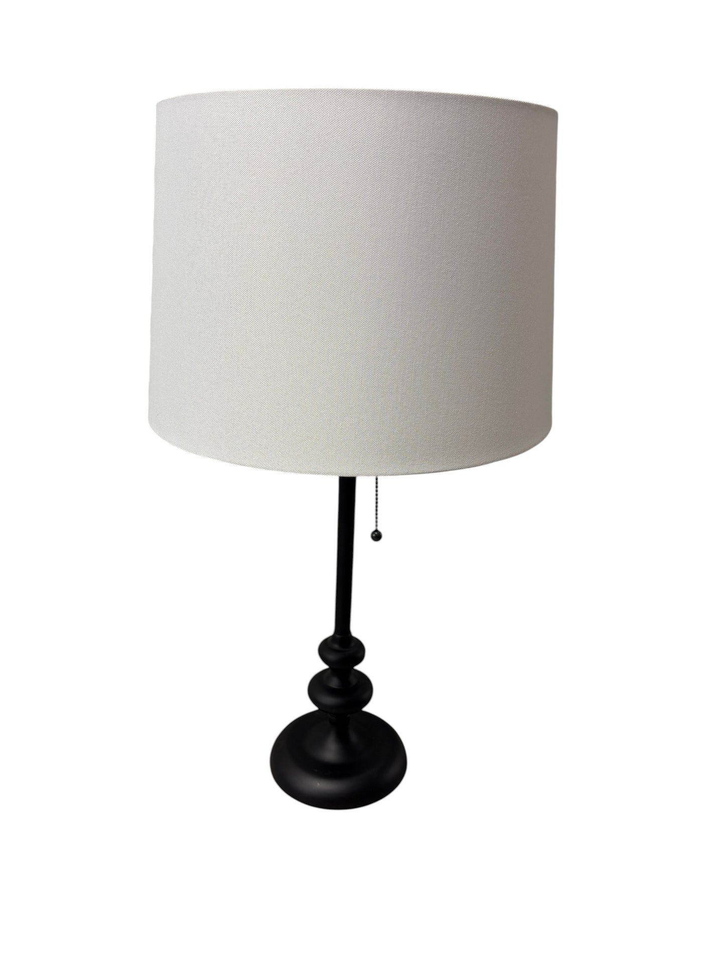 Target table lamp with a black metal base.