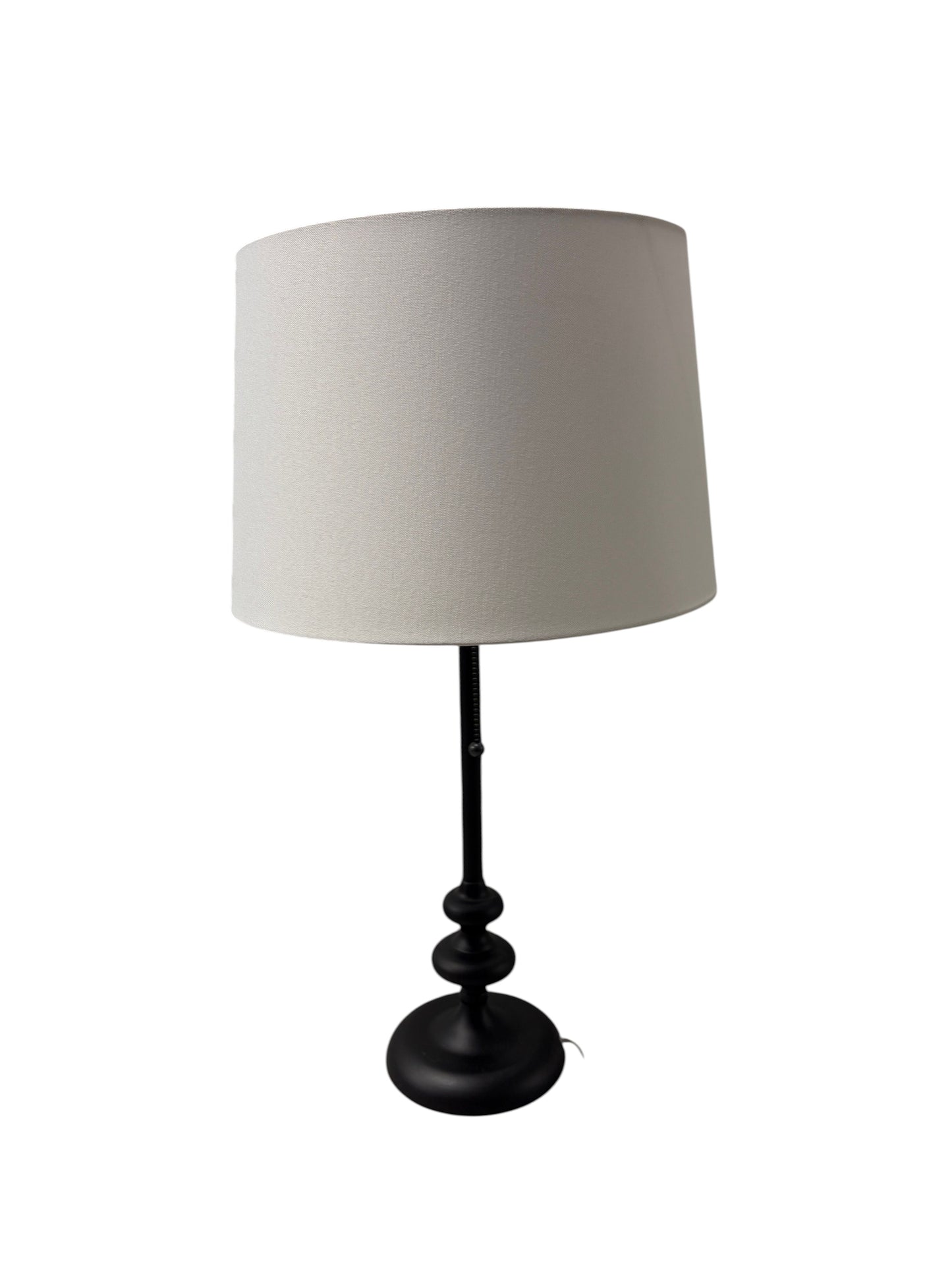 Target table lamp with a black metal base.