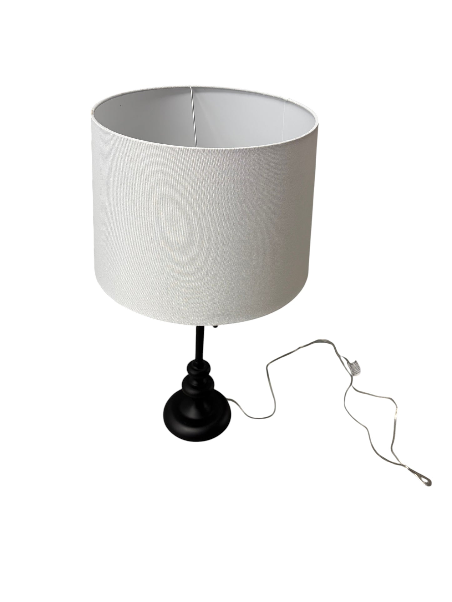 Target table lamp with a black metal base.