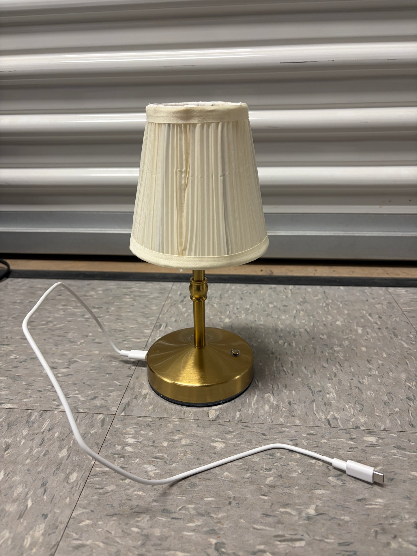 Gold rechargeable cordless lamp.