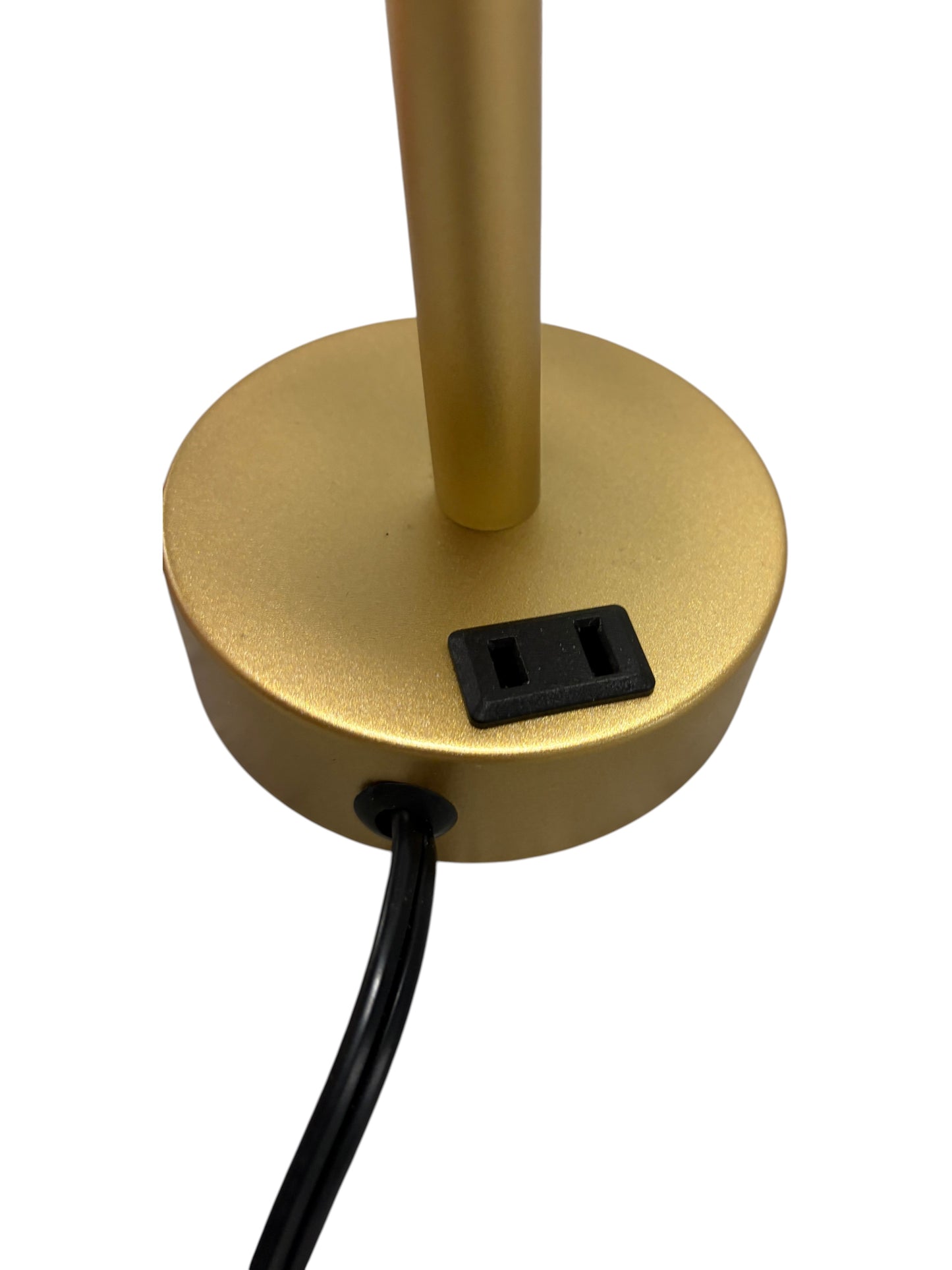 Gold lamp with a cream shade and built-in charging ports.