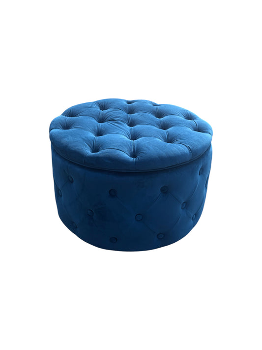 Blue round ottoman with storage inside.