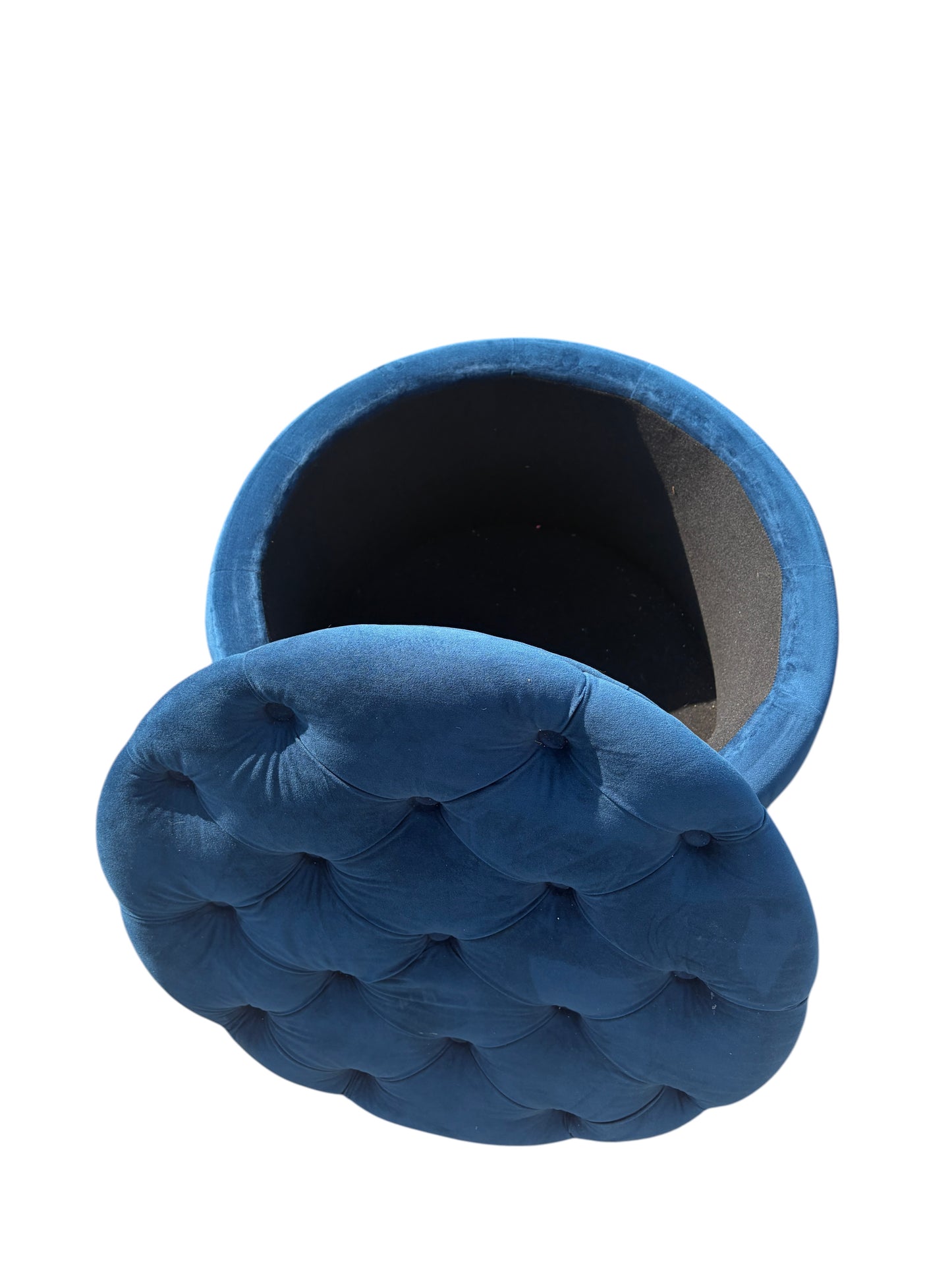 Blue round ottoman with storage inside.