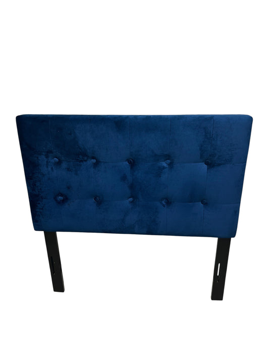Blue twin velvet headboard with black legs.