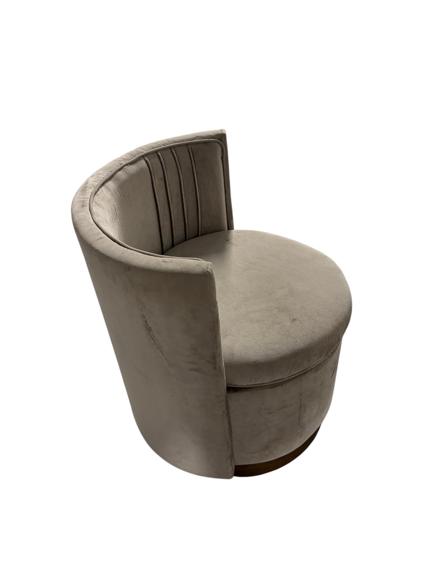 Rose gold chair on wheels with ottoman storage.