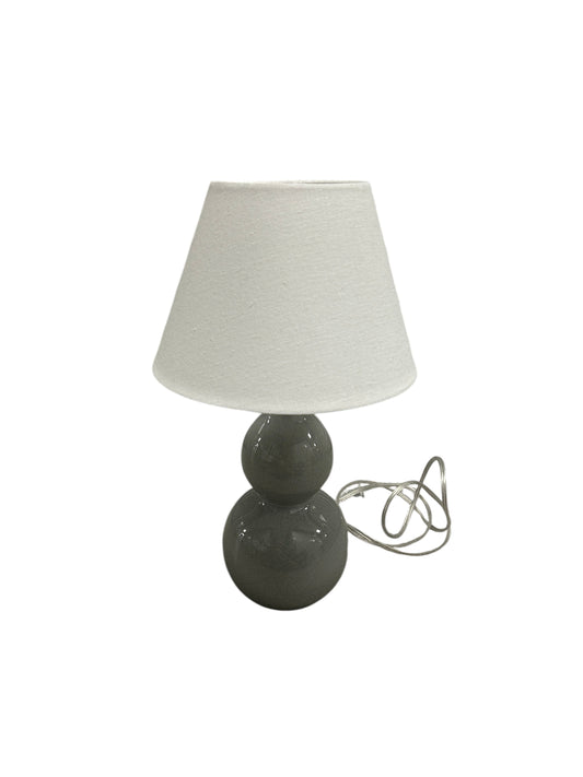 Gray table lamp with a ceramic double-sphere base.