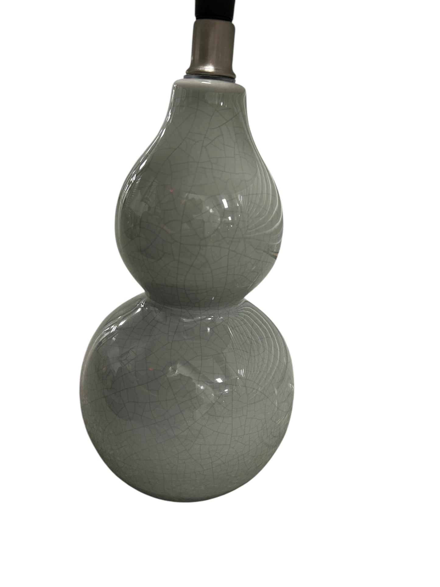 Gray table lamp with a ceramic double-sphere base.