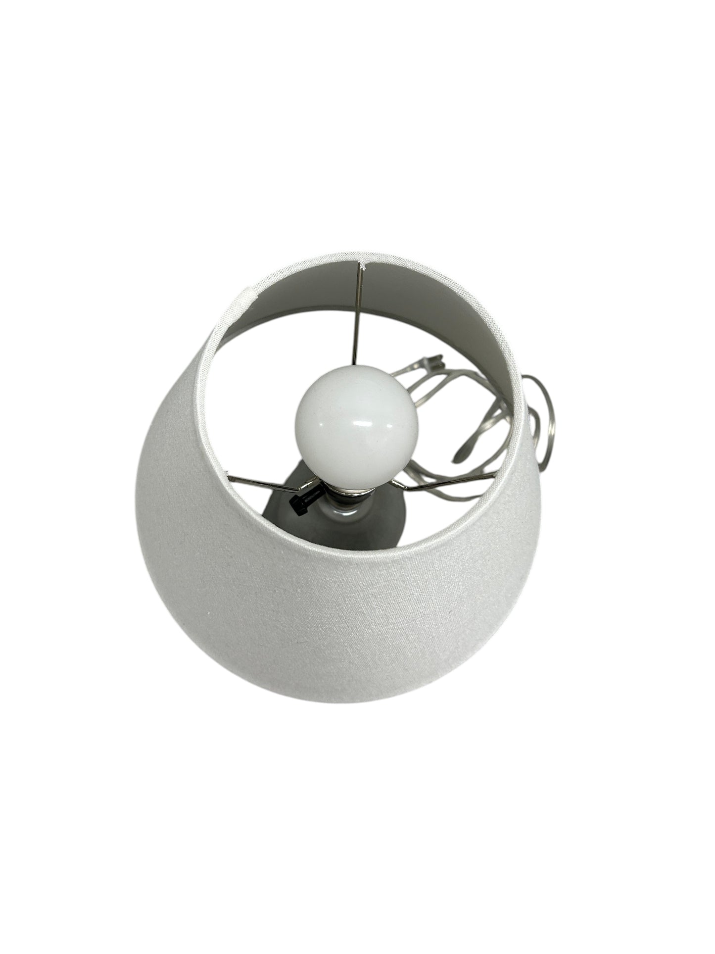 Gray table lamp with a ceramic double-sphere base.
