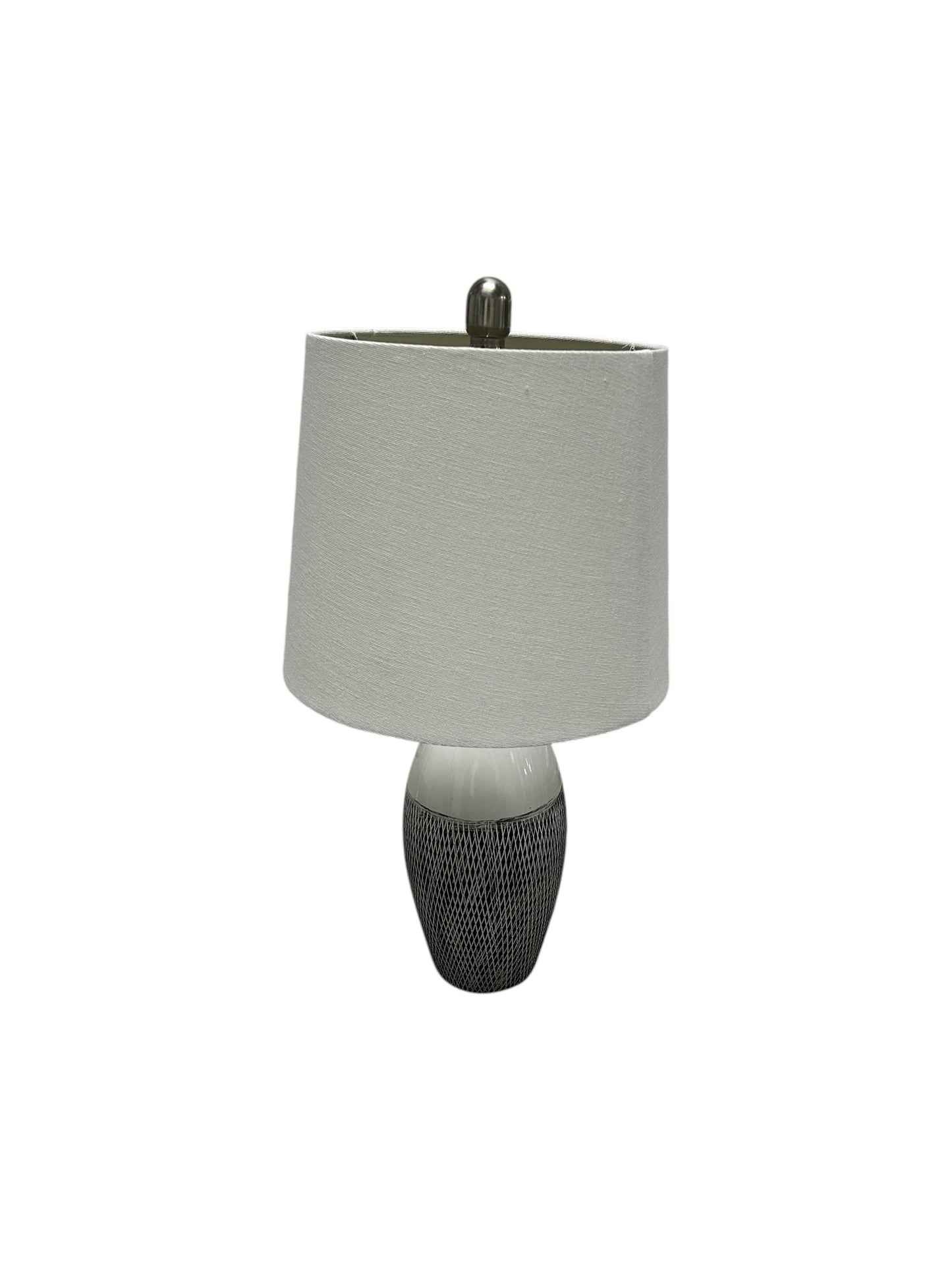 Gray and white table lamp with a textured ceramic base.