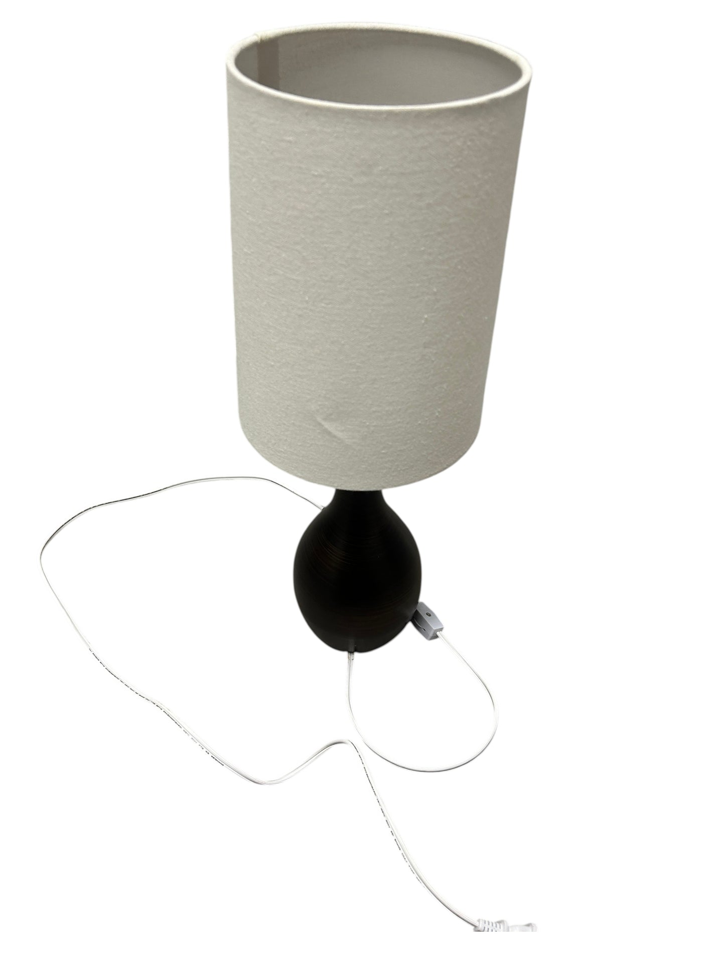 Brown wooden table lamp with cream shade.