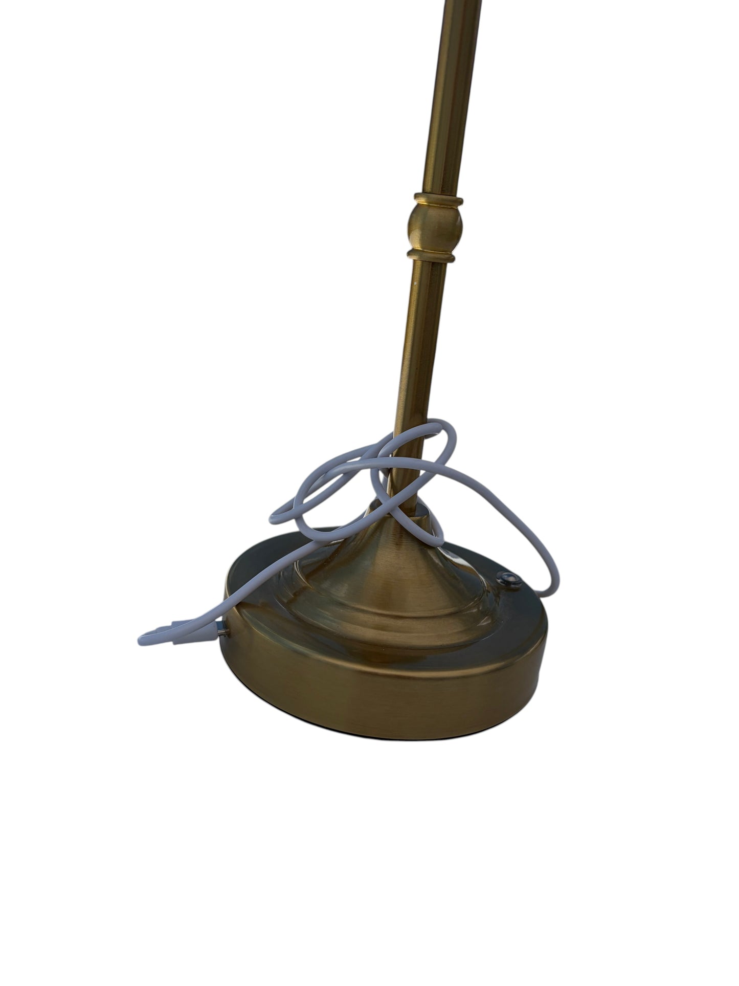 Gold table lamp with white shade.