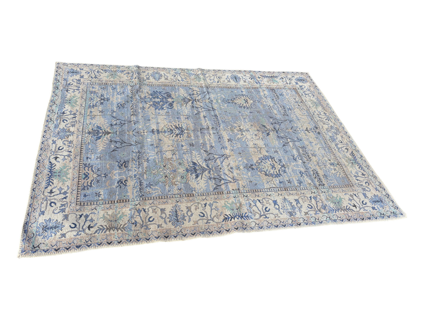 5 x 7 machine washable blue rug.