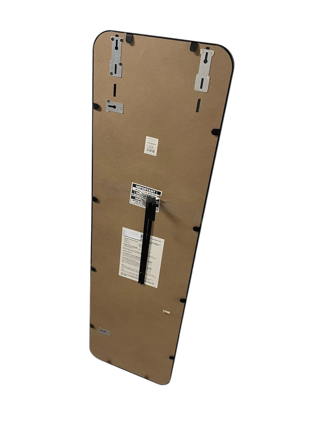 Target full-length standing floor mirror with a black frame.