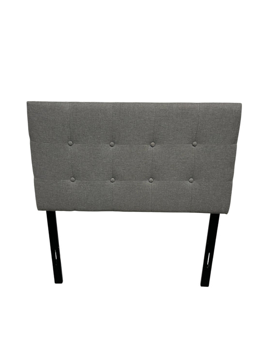 Gray twin headboard black legs.