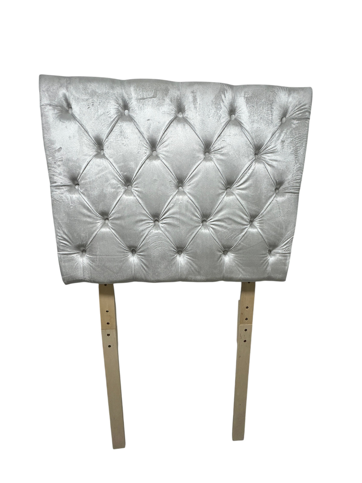 Silver twin velvet headboard with wooden legs.