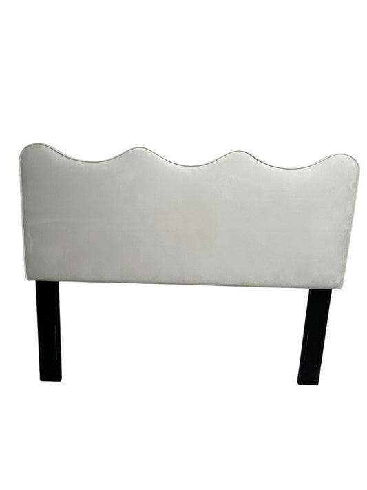 Off-white queen velvet headboard with black legs.