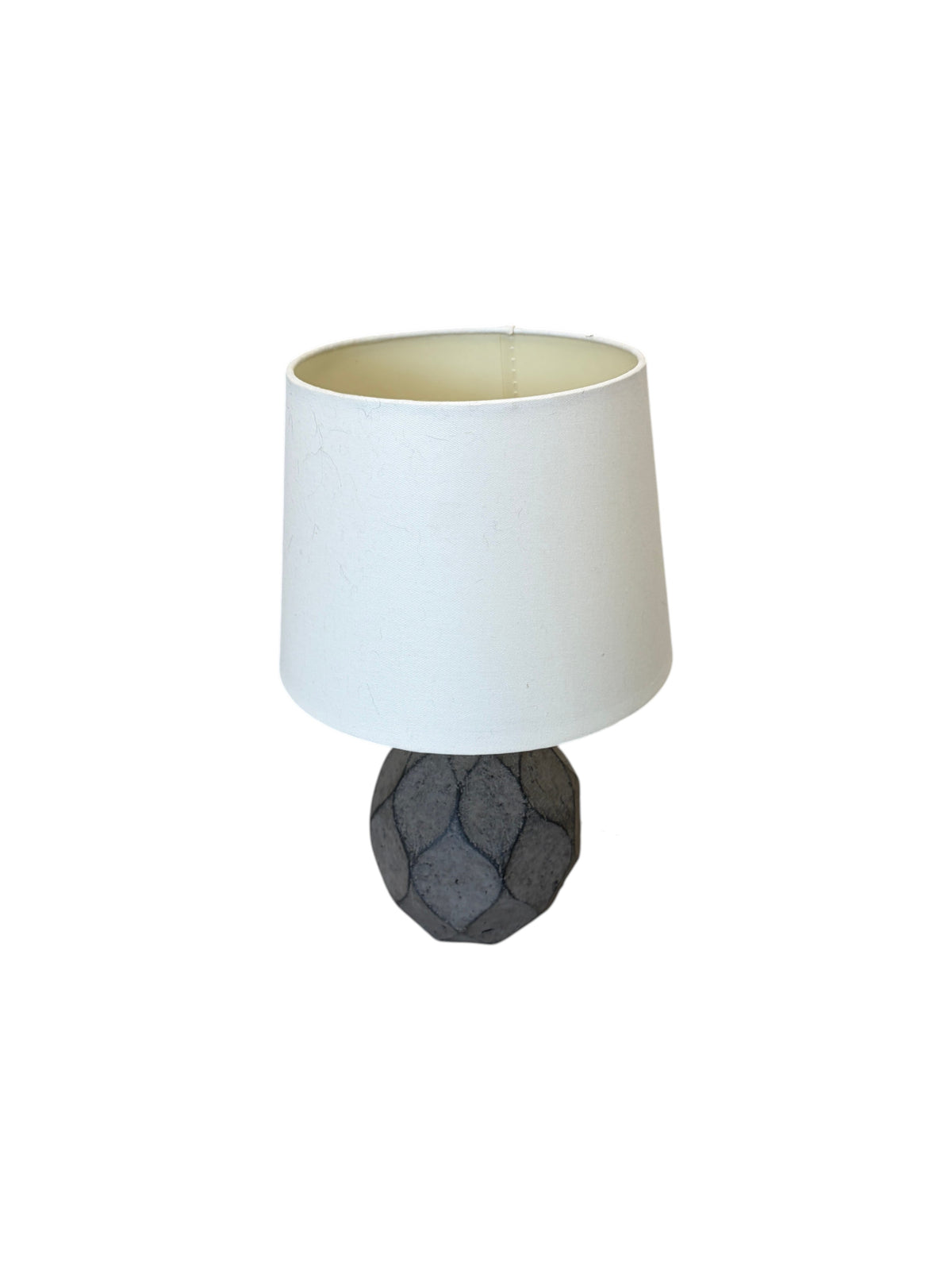Dark gray textured ceramic table lamp.