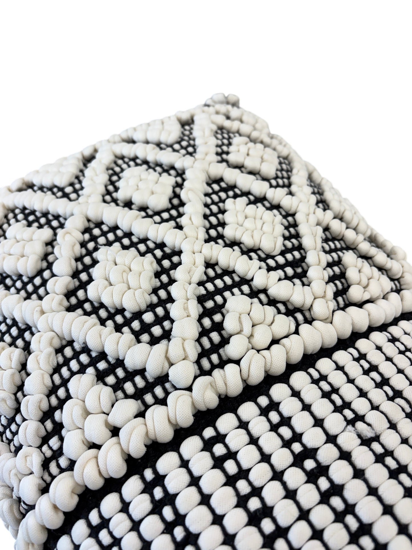 Black and white rectangular throw pillow.