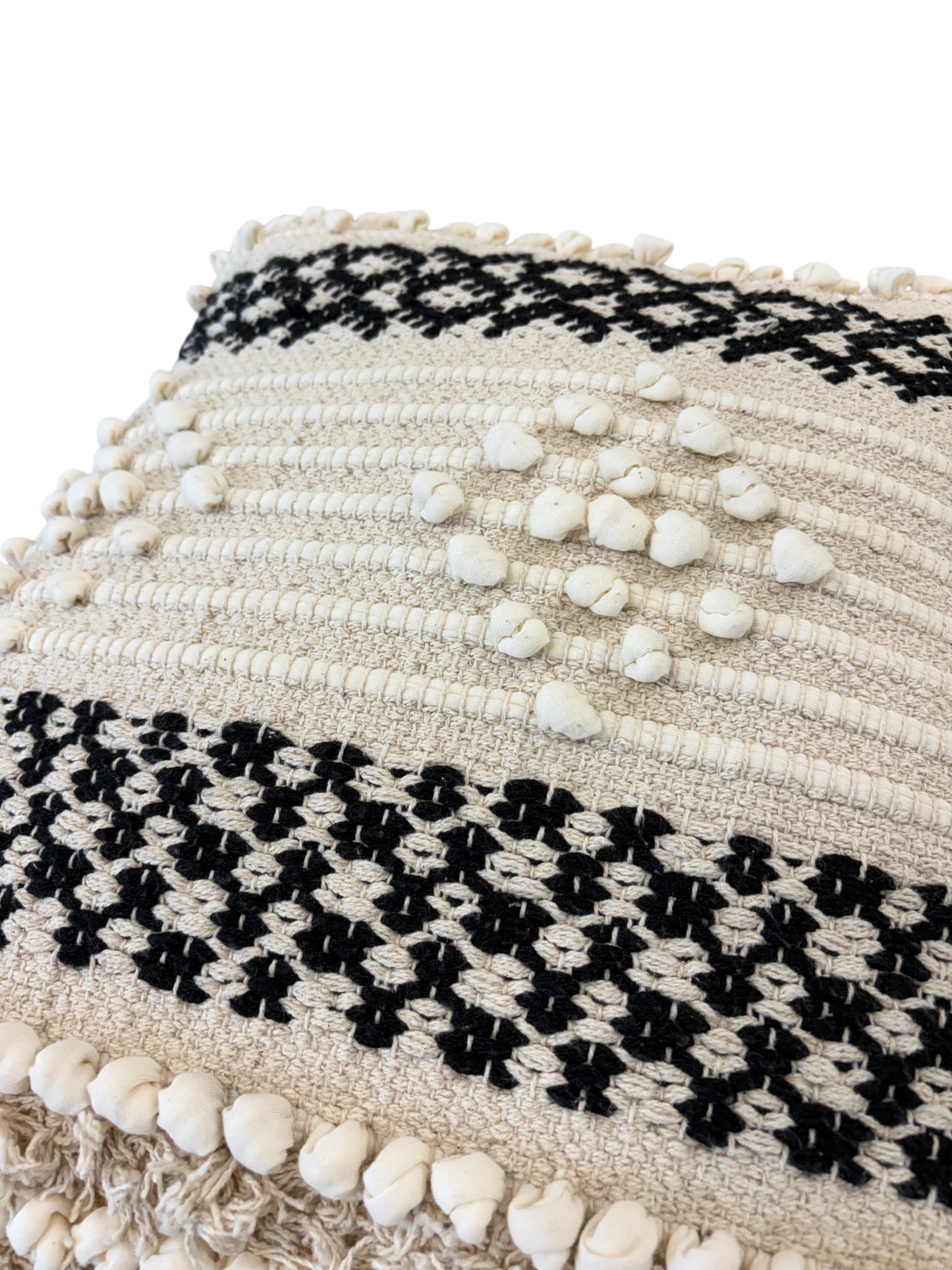 Black and white square throw pillow.