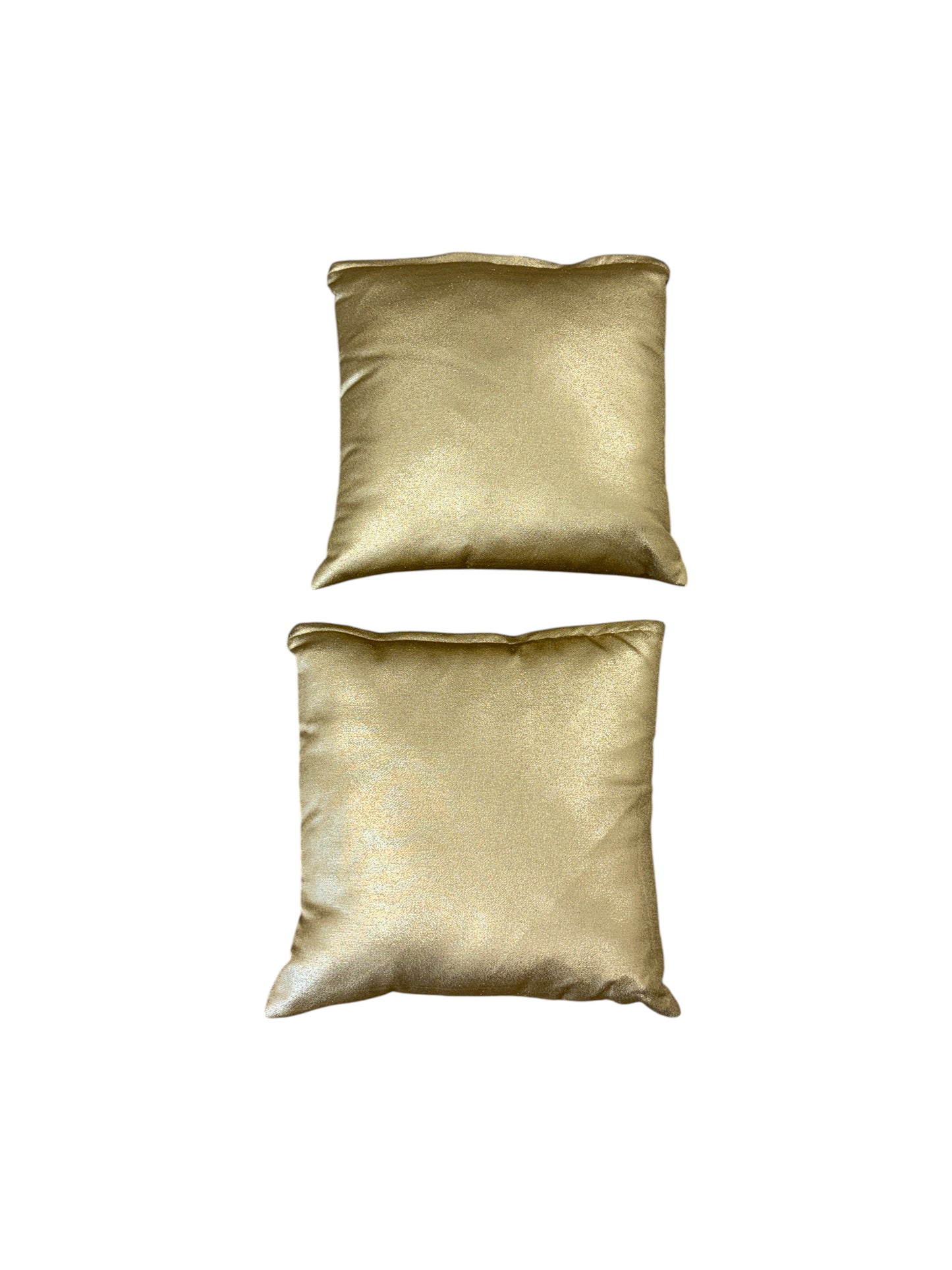 Set of 2 gold throw pillows.