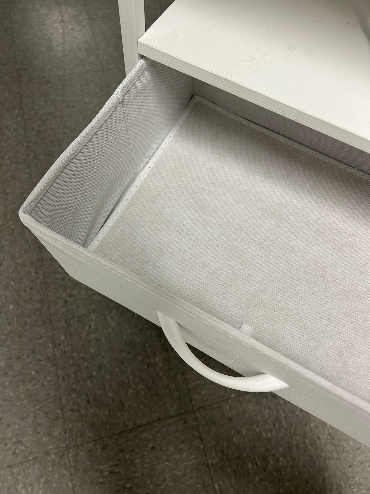 White nightstand with 5 drawers and power outlets.