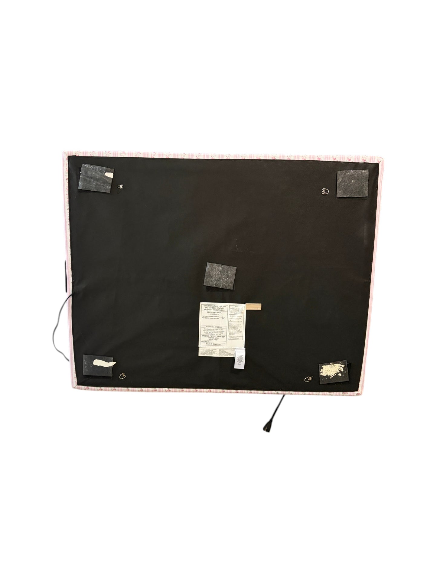 Pottery Barn Teen x LoveShackFancy pink floral twin headboard with charging port.