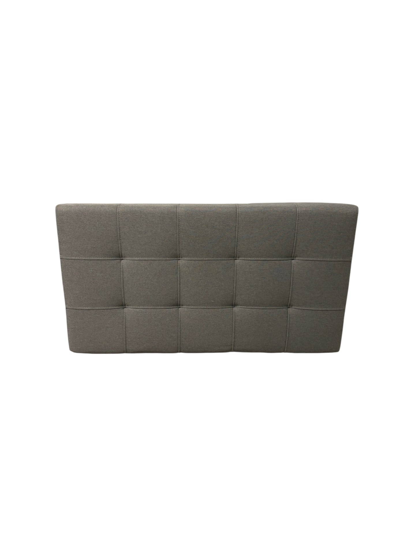 Gray upholstered twin headboard.
