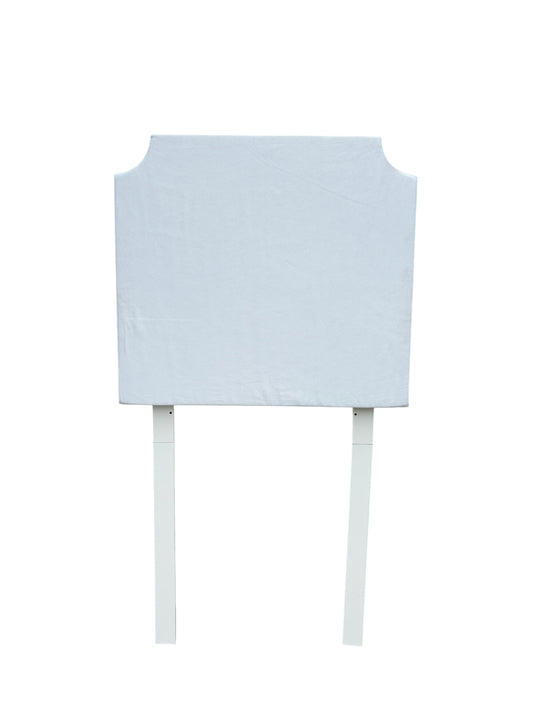 White twin headboard with wooden legs.