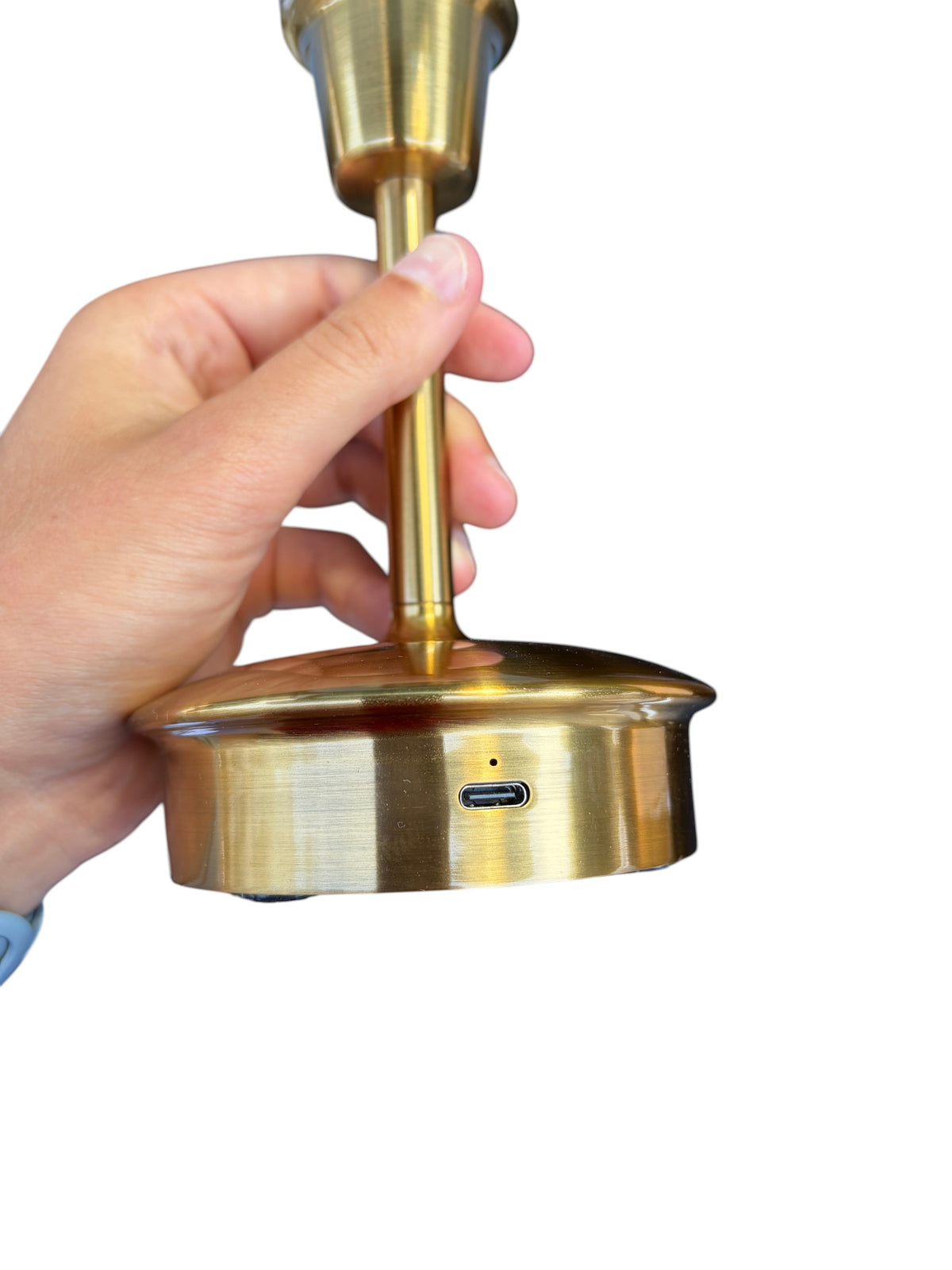 Gold table lamp with a light blue shade.