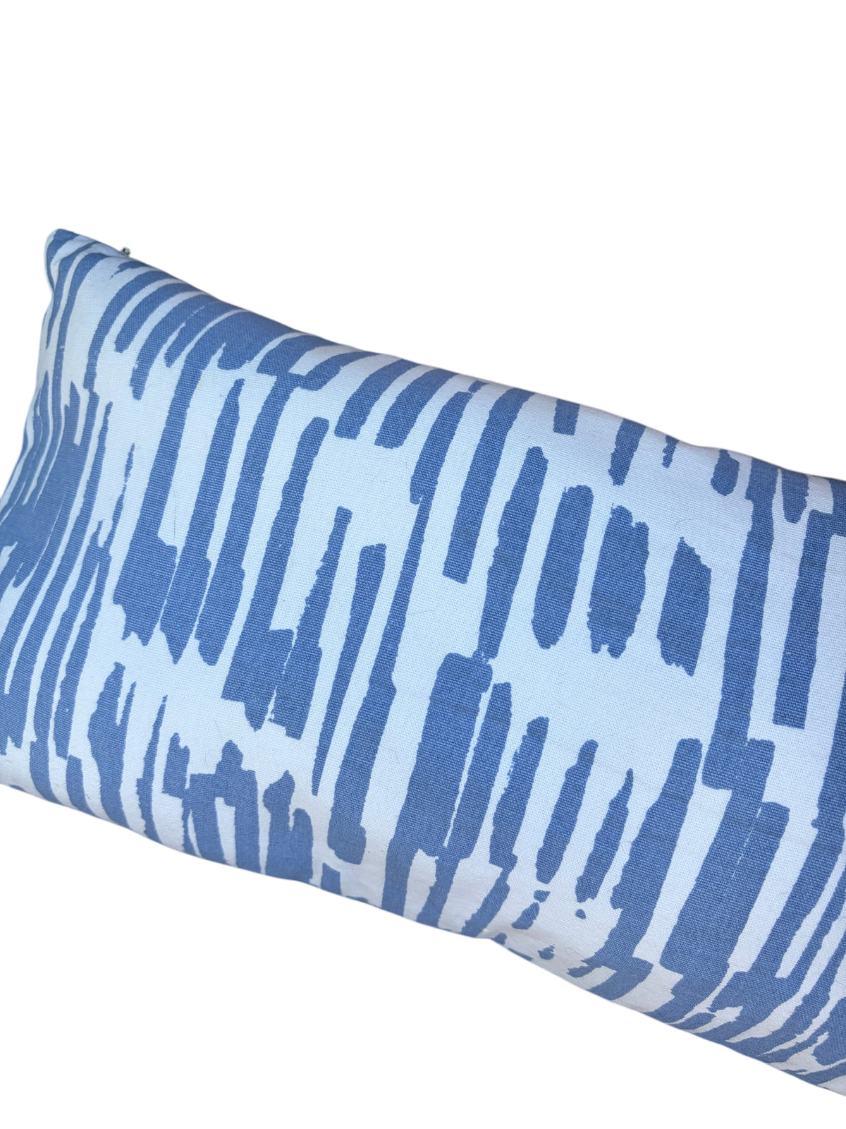 Blue and white patterned throw pillow.