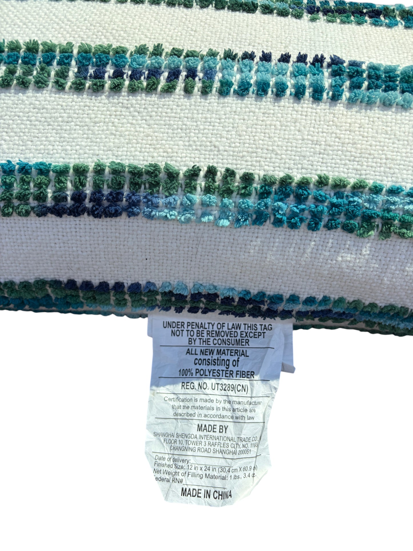 Blue and green striped rectangular throw pillow.