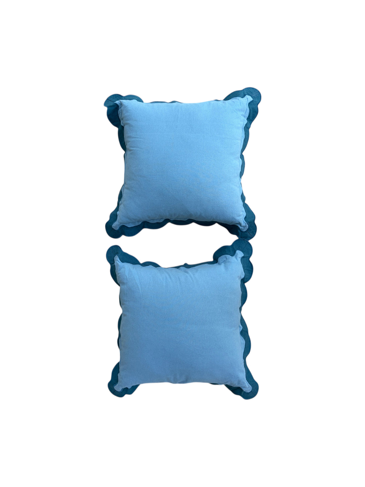 Set of 2 blue scalloped decorative pillows.