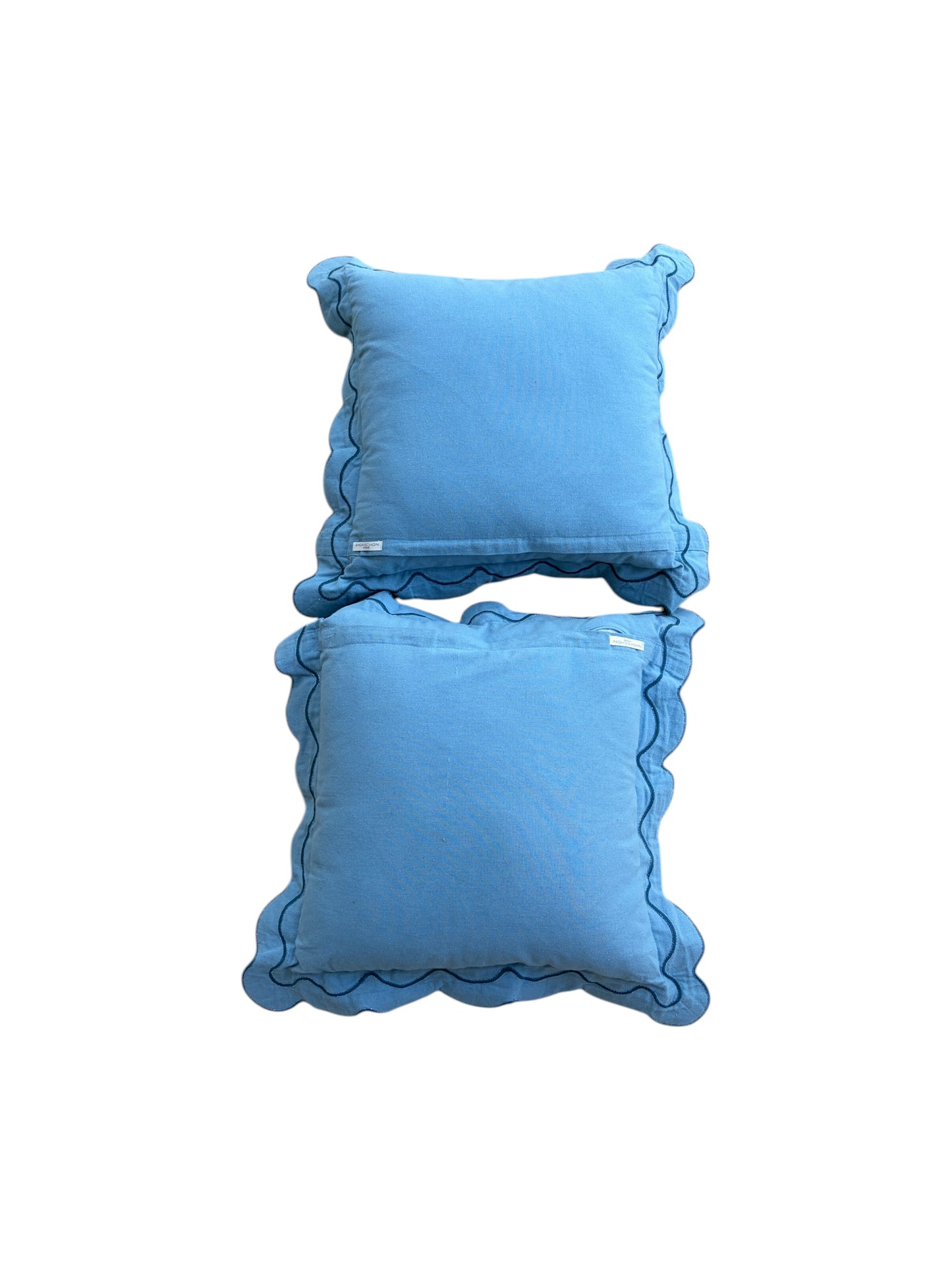 Set of 2 blue scalloped decorative pillows.