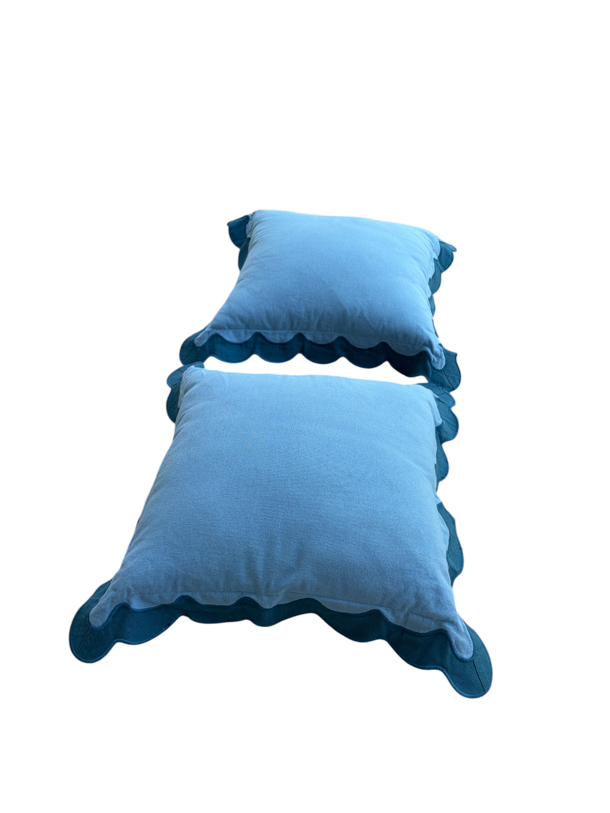 Set of 2 blue scalloped decorative pillows.