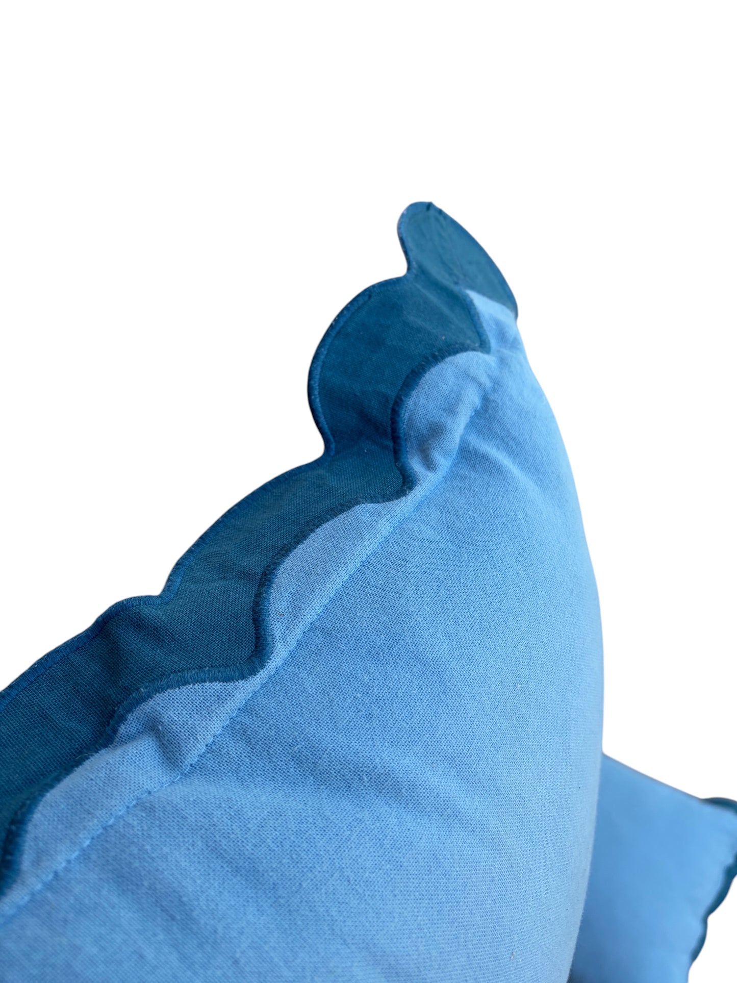Set of 2 blue scalloped decorative pillows.
