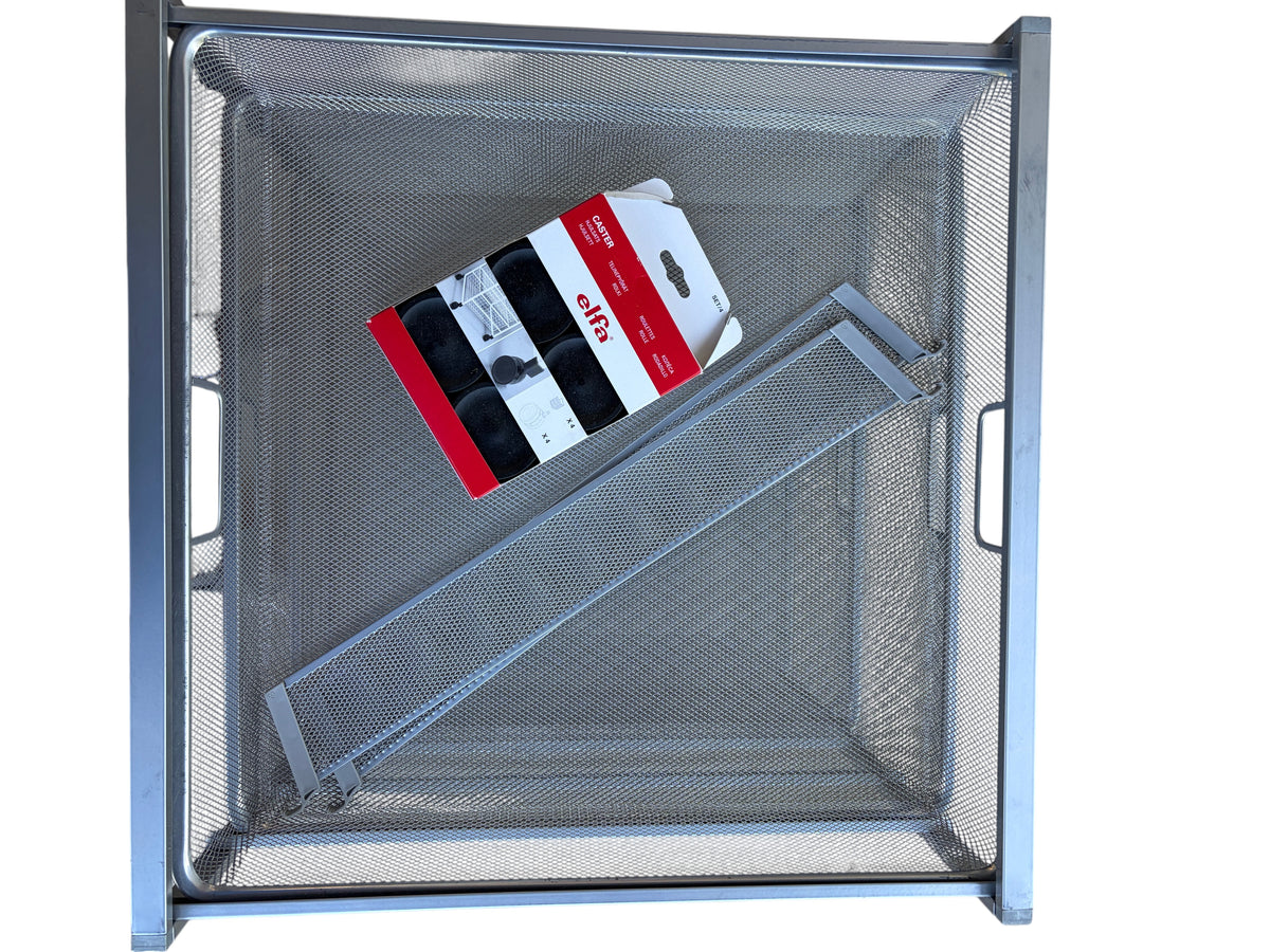 The Container Store Elfa gray metal storage with 4 drawers.
